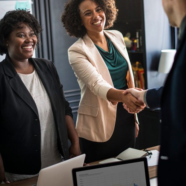 business-partners-shaking-hands-agreement business-partners-shaking-hands-agreement