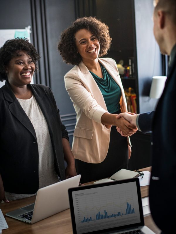 business-partners-shaking-hands-agreement business-partners-shaking-hands-agreement